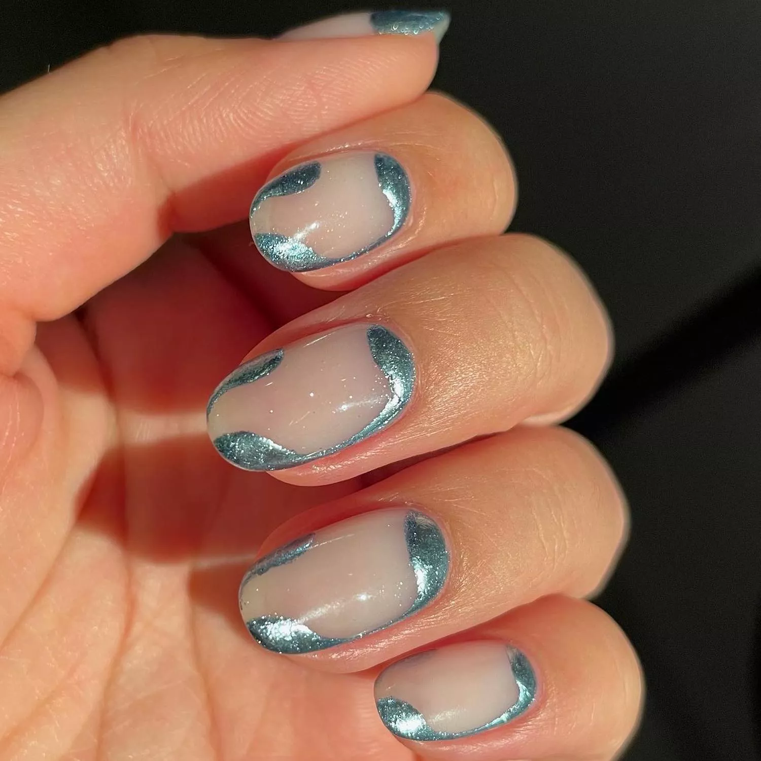 Manicure with sheer center and chrome foil borders