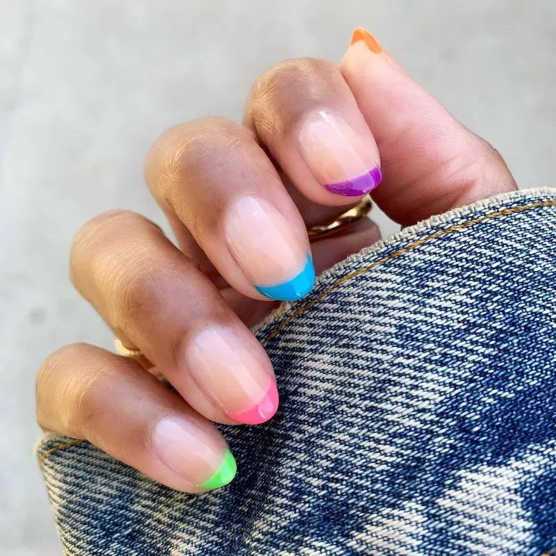 French manicure with multicolored neon tips